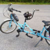 Blue adaptive tandem bicycle.