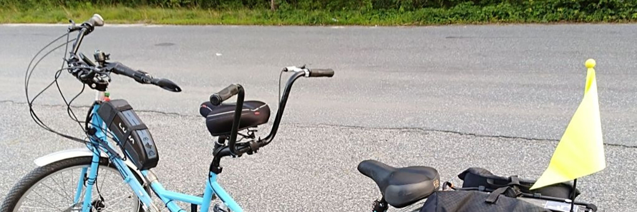 How Decorating My Cane Helped Me After a Traumatic Brain Injury Blue adaptive tandem bicycle.