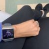 Amanda's smart watch monitoring vitals in the waiting room.