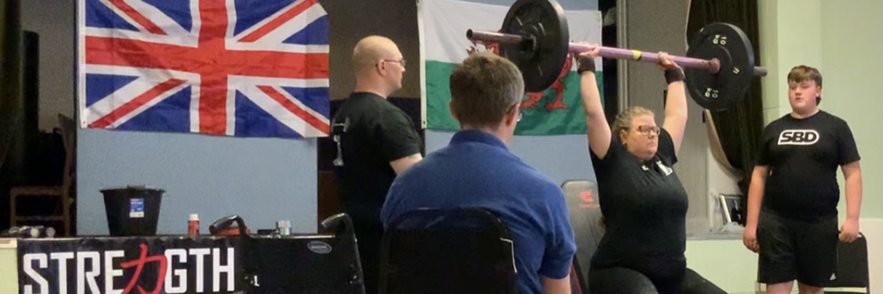 My Path to Becoming an Adaptive Athlete and Record-Holding Strongwoman Steffi competing in a strongwoman event.