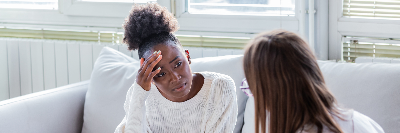 Why Mental Health Care Should Be Part of Surgery Recovery Woman meeting with doctor or therapist.