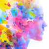 Paintography profile of woman's face fading into bright colorful