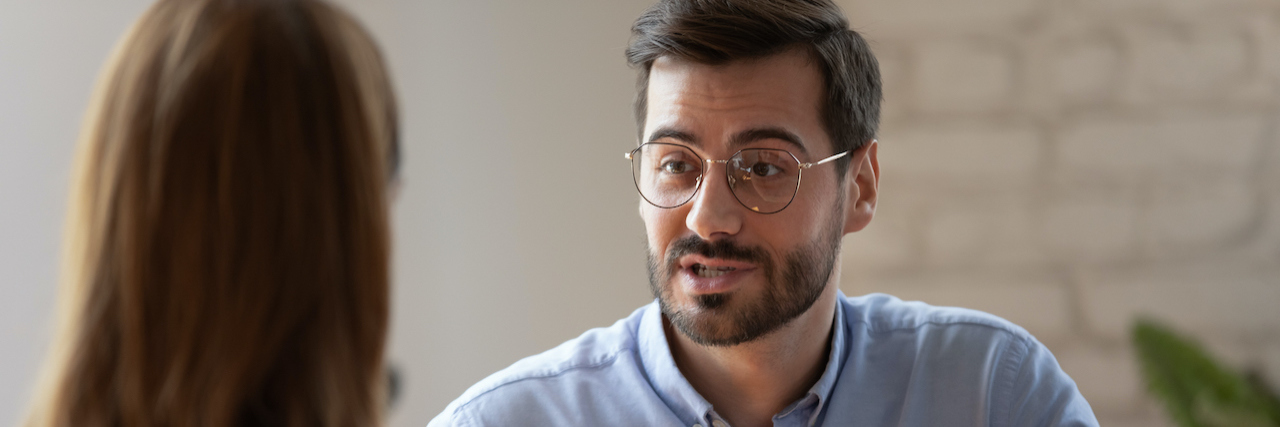 Learning What to Say and What Not to Say When You Have Schizophrenia Confident man speaking with another person