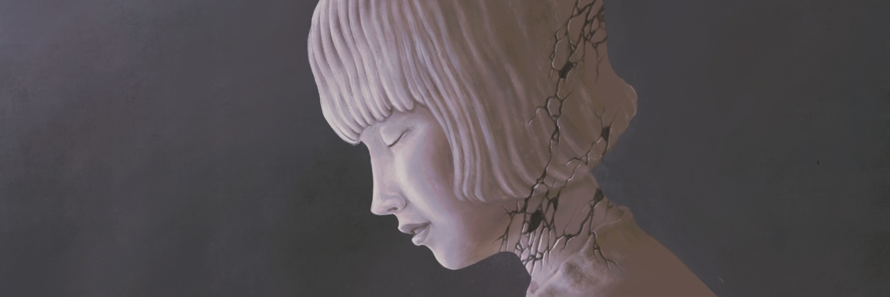 Depression vs. Autistic Burnout: How to Tell the Difference Sad statue of a woman experiencing autistic burnout and depression.