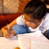 Child doing math homework.