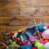 Enjoying hobbies with a chronic illness: Knitting needles and yarn.