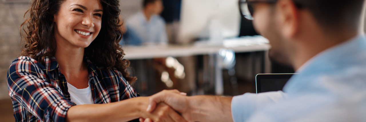 Experiencing Employment Discrimination Due to Learning Disabilities Woman at a job interview.