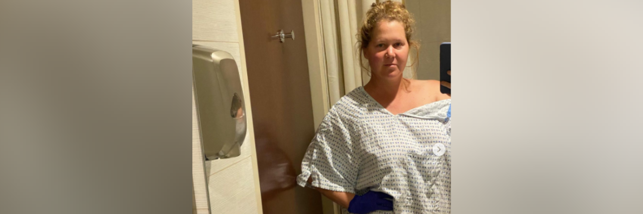 Amy Schumer in hospital gown after endometriosis surgery