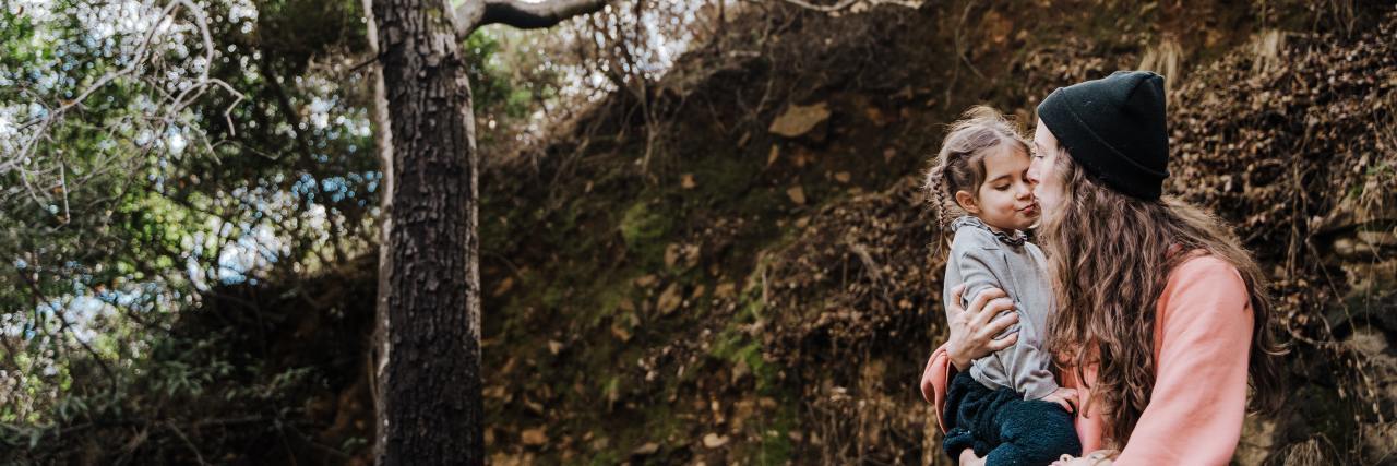 Why I Plan to Tell My Children About My Suicide Attempts photo of a mother and daughter in woods