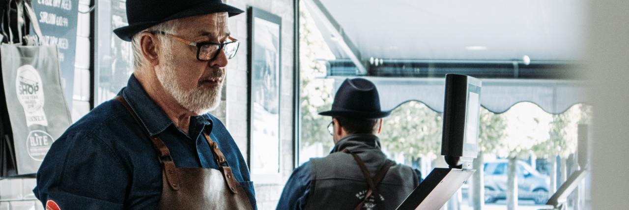 photo of a man working in a coffee shop