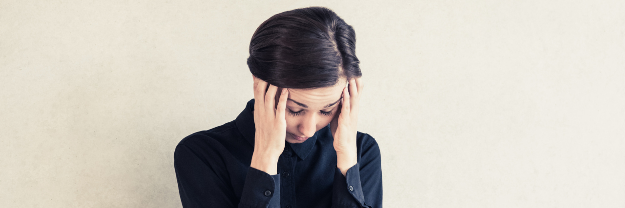 What to Know About the 4 Common Headaches (Besides Migraine) Young women holding her head, stressed