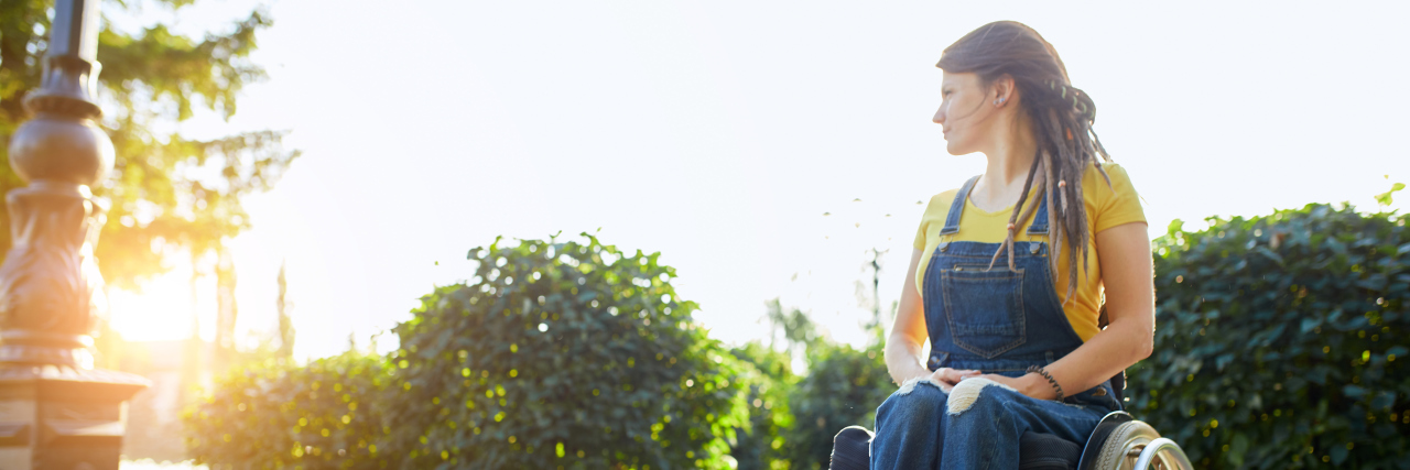 People With Disabilities Have the Right to Set Boundaries Young woman in wheelchair looking into the distance.