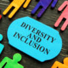 Diversity and inclusion surrounded by colorful stick figures.