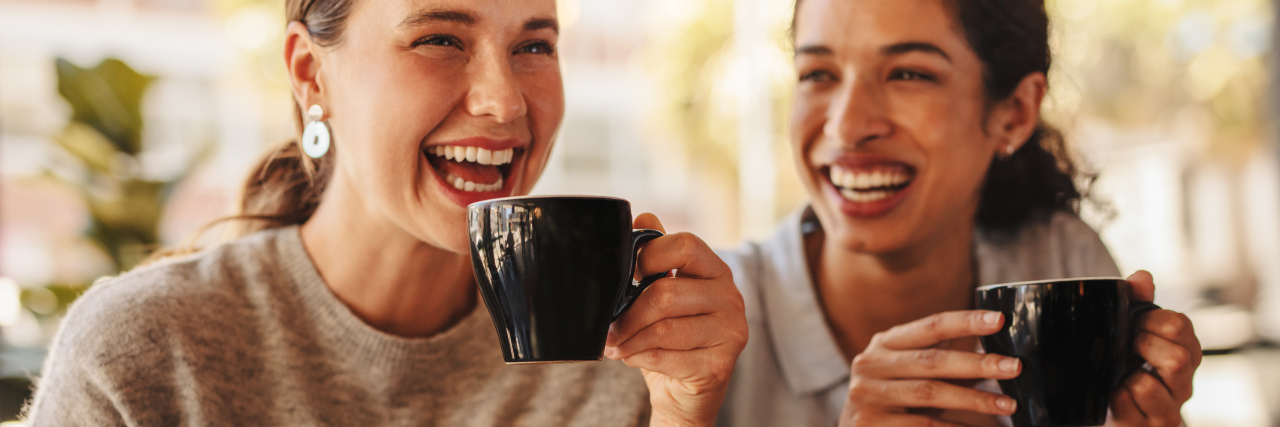 3 Myths About Living With Fibromyalgia -- Debunked Two friends having coffee together in a coffee shop.