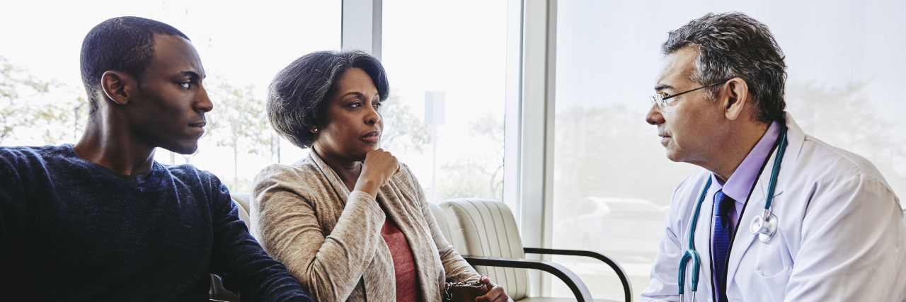 I Should Not Need a Man With Me to Be Taken Seriously at Medical Appointments man and woman talking to doctor.