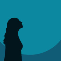 Silhouette of woman looking up.
