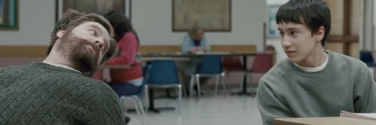 screenshot from the movie "It's Kind of a Funny Story" showing two characters talking in psychiatric hospital