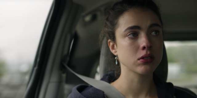 screenshot from the Netflix show Maid, showing the main character looking upset in a car
