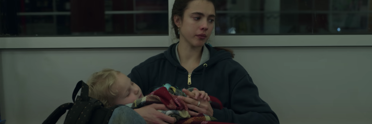 If You Find Netflix's ‘Maid’ Triggering, This Could Be Why screenshot from Netflix series Maid, showing the main character crying and holding her young child