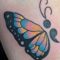 Photo of contributor's butterfly tattoo