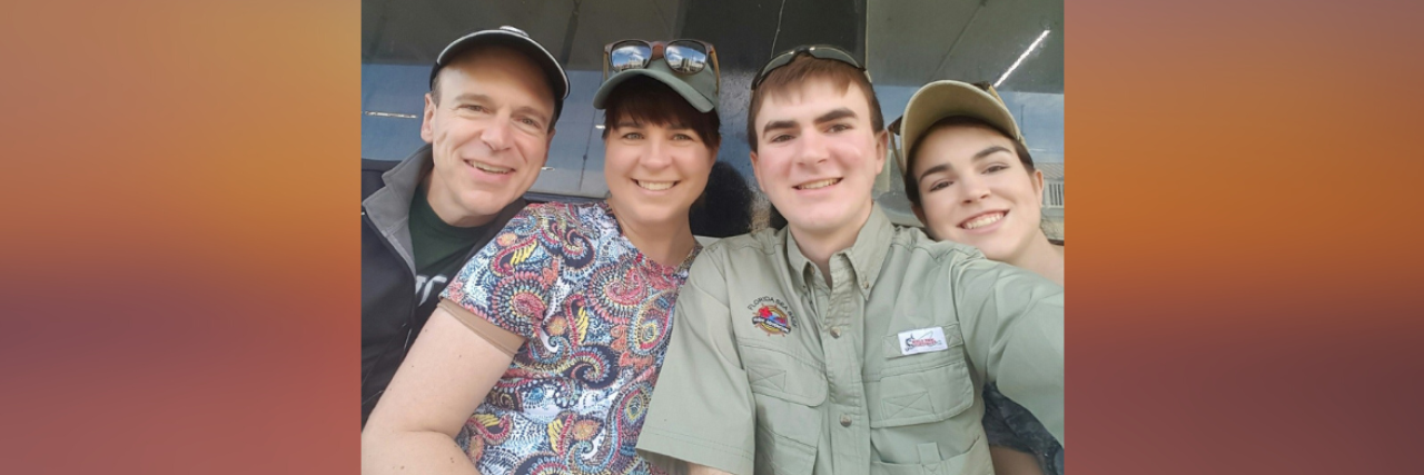 When You Have to Fight Insurance as a Breast Cancer Survivor Image of contributor smiling at camera with her family
