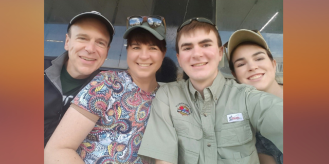 When You Have to Fight Insurance as a Breast Cancer Survivor Image of contributor smiling at camera with her family