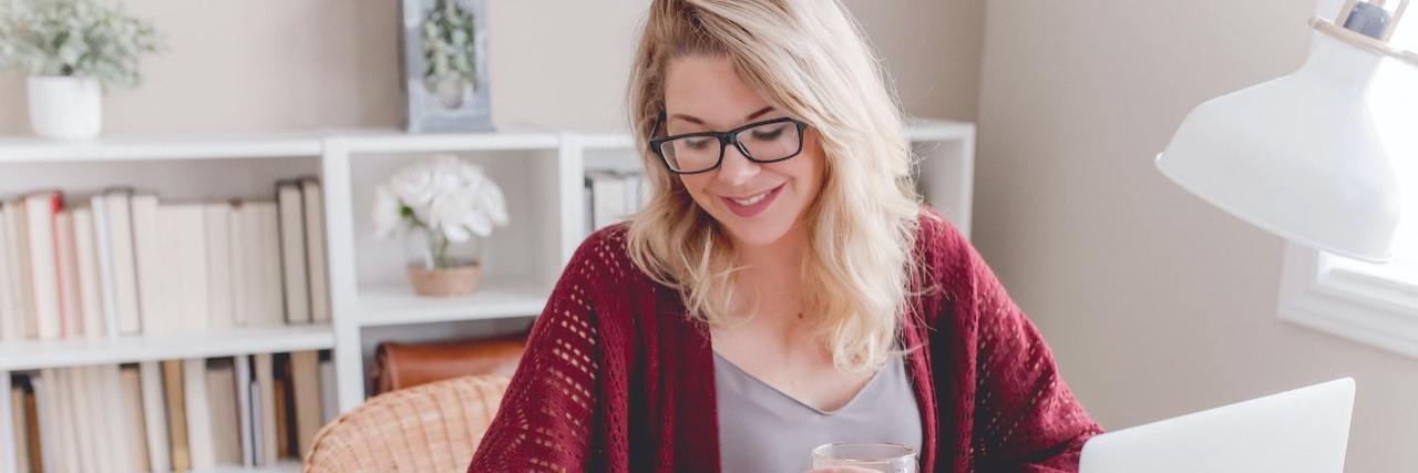 Advocating for Chronic Pain Patients During the Opioid Epidemic Woman sitting in office by computer