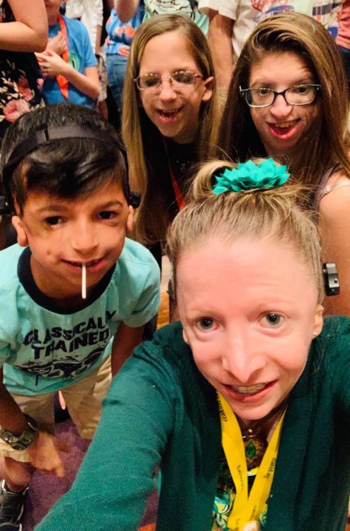 Group picture with Cynthia Cherise Murphy and Katie Whicker at a craniofacial event in 2019.