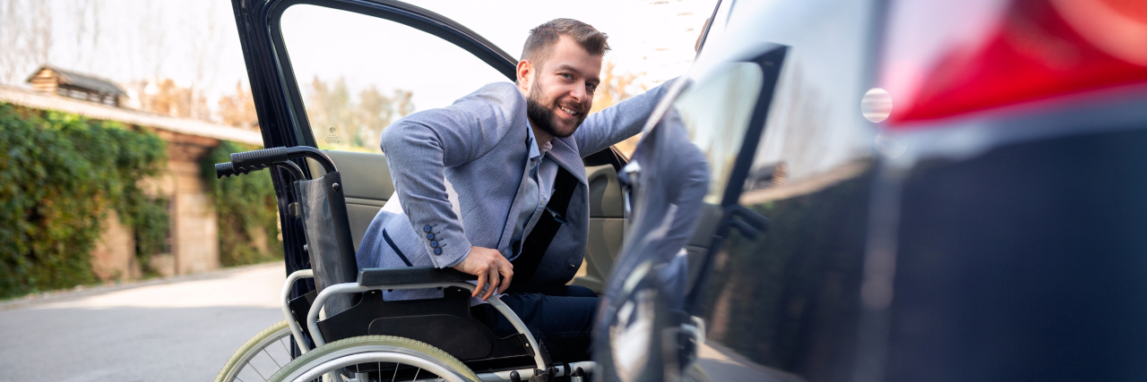 How to Load a Wheelchair Into a Car in New York City Disabled man attempting to get in the car.