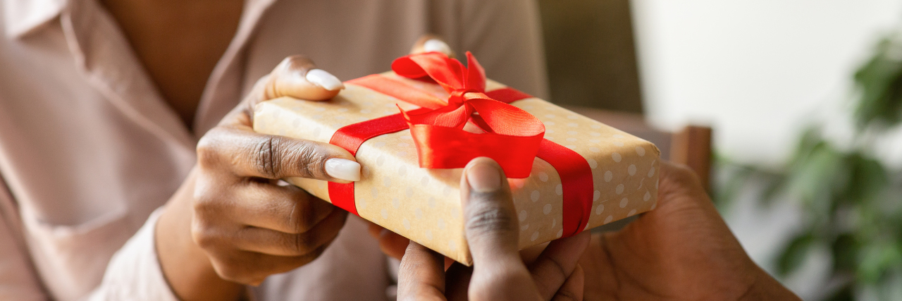 Giving a gift to a loved one.