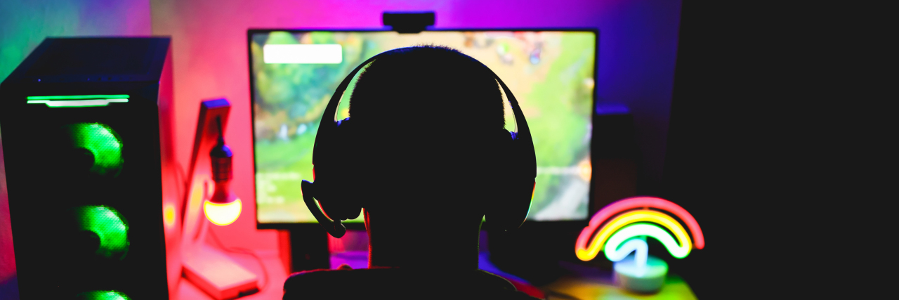 Why I Love Streaming as Someone With Chronic Illness Streamer gamer playing a strategy game in broadcast.