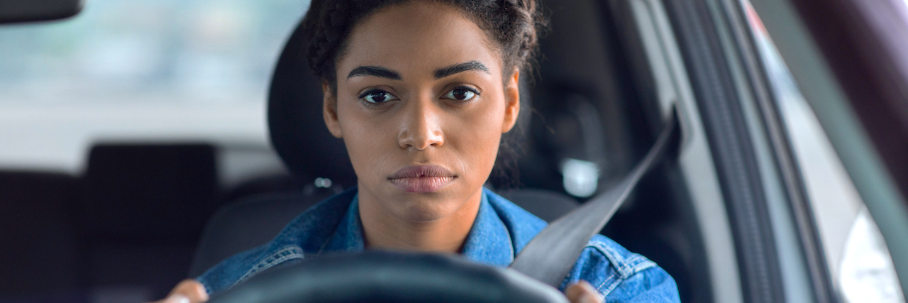 A woman driving a car