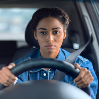A woman driving a car