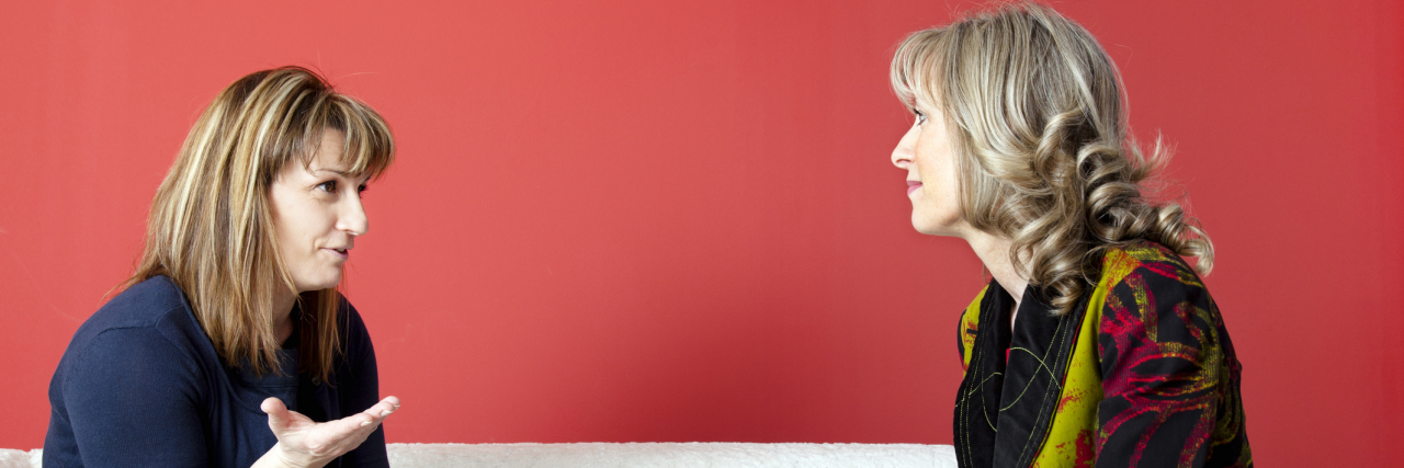 'Doing the Work' in Therapy: You Have to Do More Than Show Up Two women talking, sitting on a couch next to each other