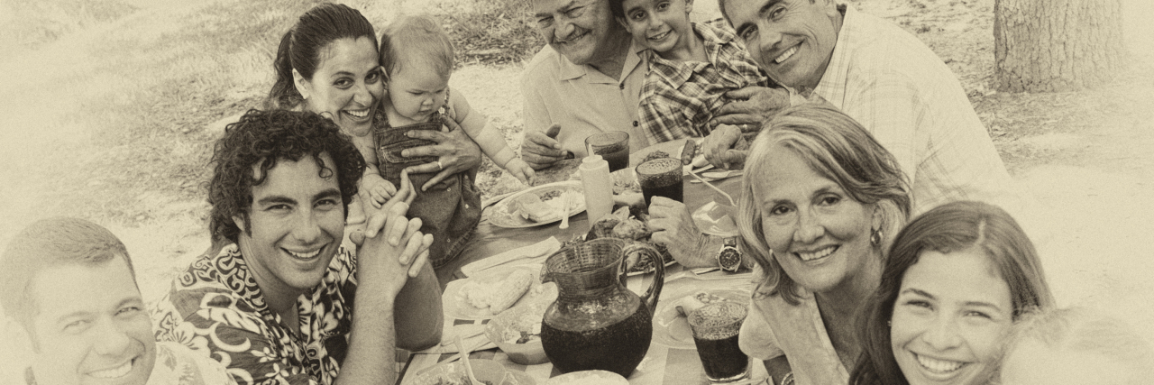 Multi-generational family reunion picnic