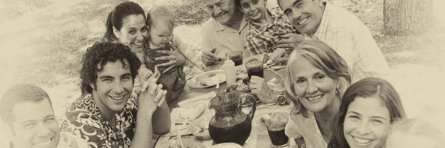 Multi-generational family reunion picnic