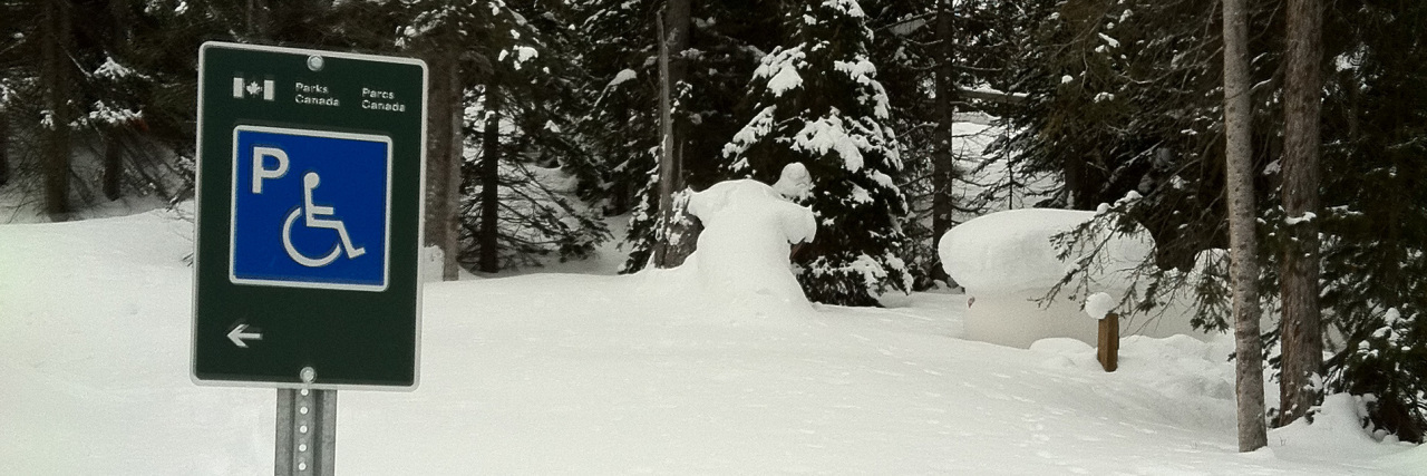Why I Dread Winter Weather as a Power Wheelchair User Disability parking in Canada after snow in winter.