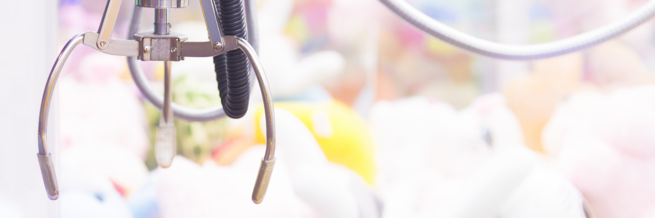 I Never Knew My Love of Claw Games Would Help With Chronic Illness Claw machine game.