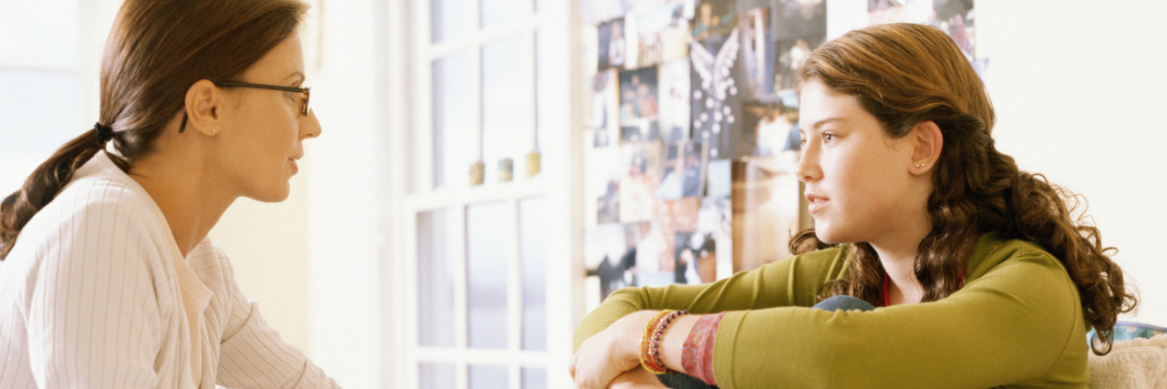 4 Tips for Parenting Teens With Eating Disorders During Thanksgiving Mother and teen daughter talking.