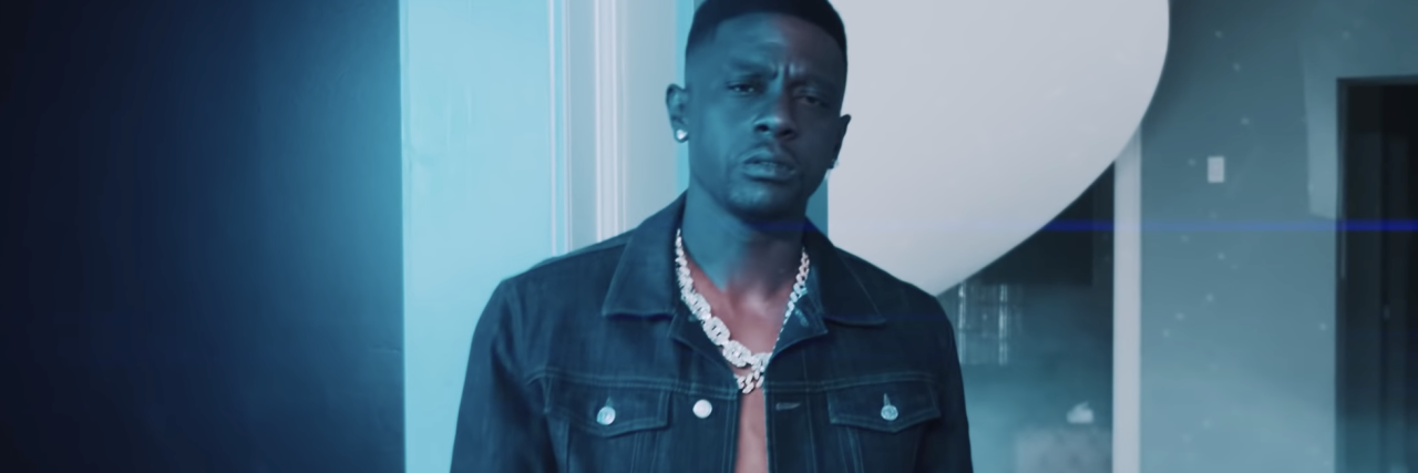 screenshot from Boosie Badazz's video for Hell's Angel, showing the rapper looking into the camera with a serious expression