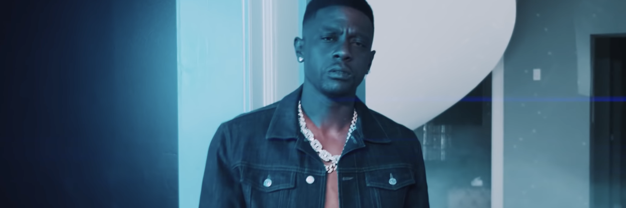 How Rapper Boosie Reminded Us That We Need to Protect Gay Black Men screenshot from Boosie Badazz's video for Hell's Angel, showing the rapper looking into the camera with a serious expression