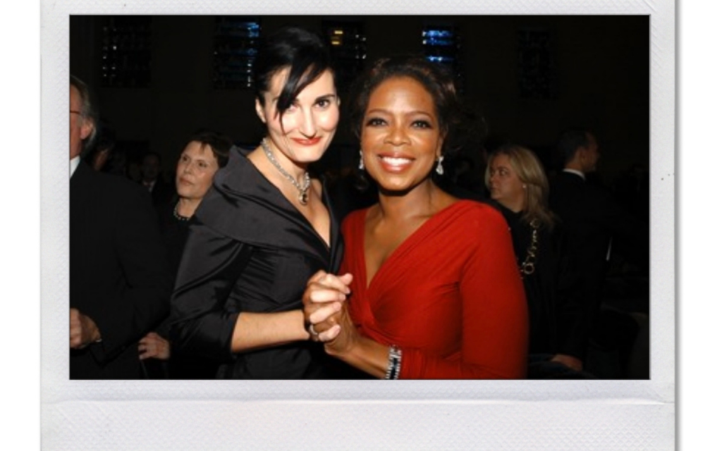 photo of Atoosa Rubenstein, former editor-in-chief of Seventeeen and CosmoGIRL! She is posing hand in hand with Oprah, both smiling for the camera