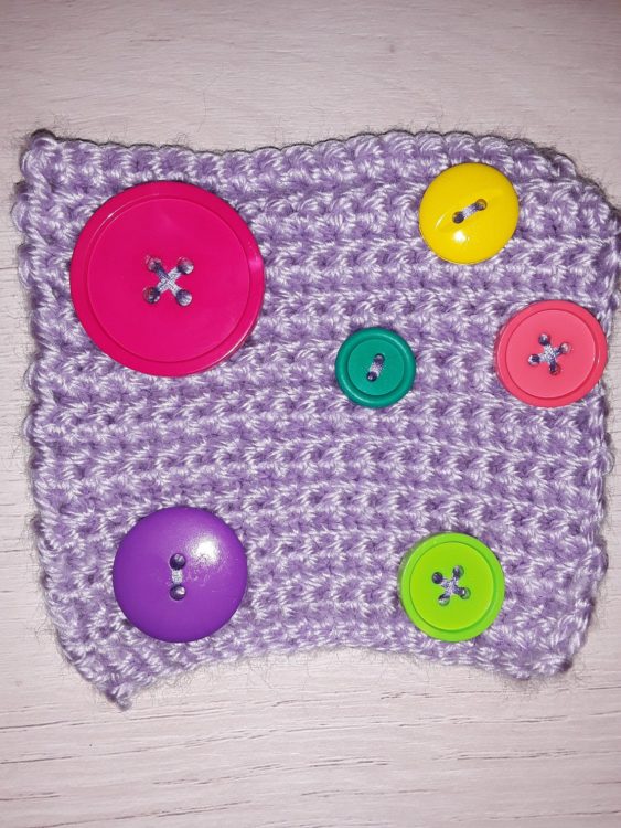 Button crochet stim toy.