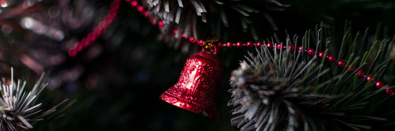 a bell in a Christmas tree