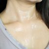 Woman with sweaty neck.