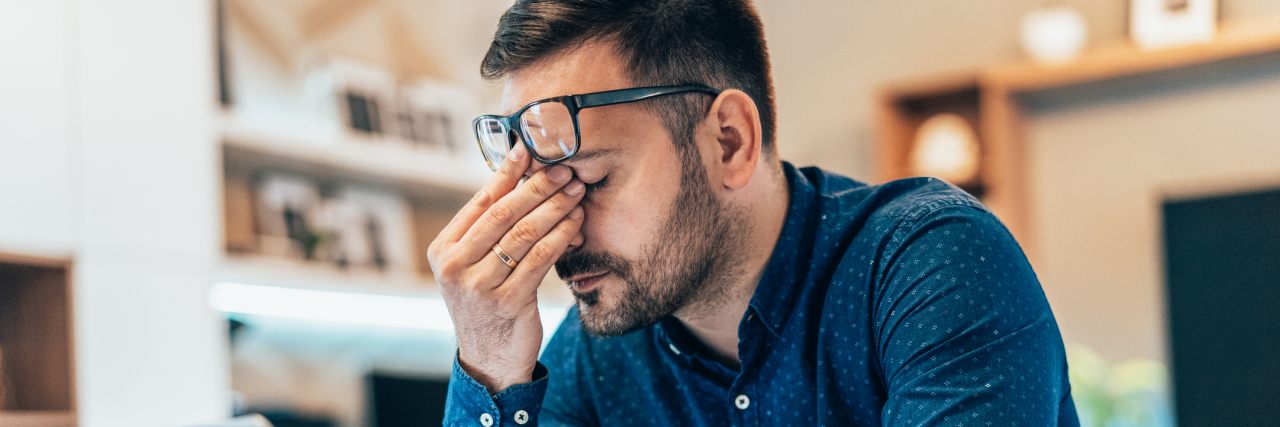 7 Ways to Cope With Rejection in Your Job Search Tired young businessman working at home using laptop, looking anxious