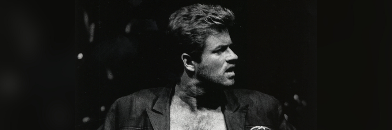 I Had the Chance to Meet George Michael, but My Social Anxiety Said No Musician George Michael with his shirt unbuttoned looking away