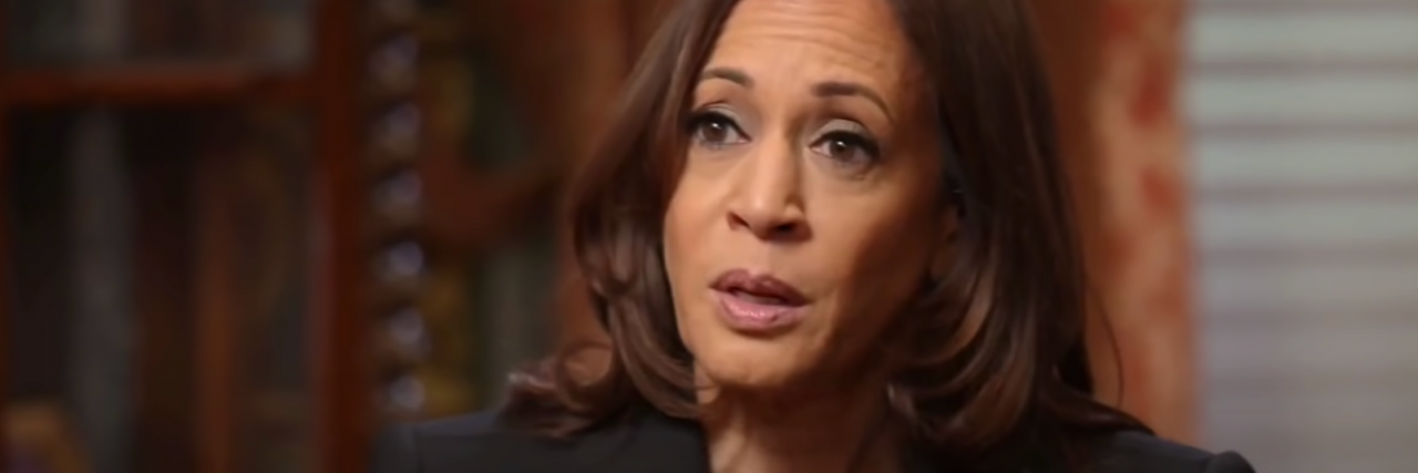 Why Vice President Harris' Remarks on COVID-19 Testing is Harmful Kamala Harris looking at the camera during an interview on the "Today Show." She looks distraught and is sitting with a library in back of her. Her suit is black.