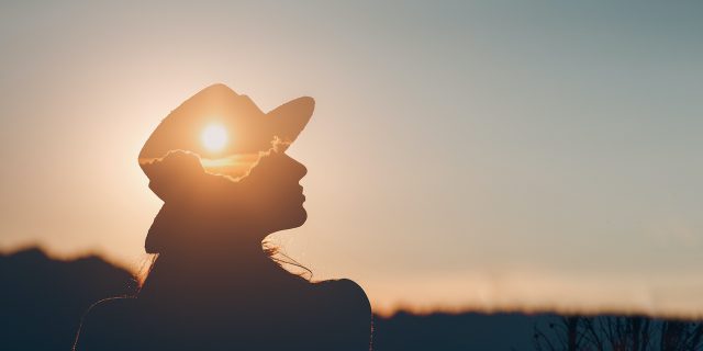 One Hell of a First Exposure and Response Therapy Session for OCD Silhouette of person wearing a hat with sunset layered onto it