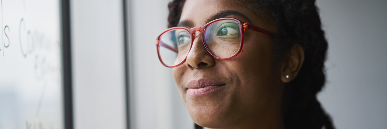 SC RED Supports Reproductive Health of Sickle Cell Disease Patients Thoughtful Black woman looking upward.